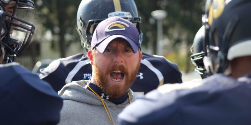 football coach shouting at players